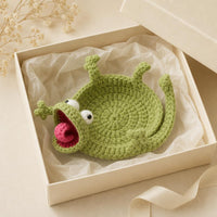 Posavasos de ganchillo lagartija presentado como regalo